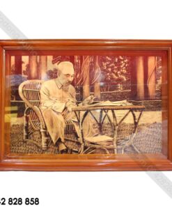 BÁC HỒ NGỒI ĐỌC BÁO NHÂN DÂN XÃ LUẬN 85CM X 60CM